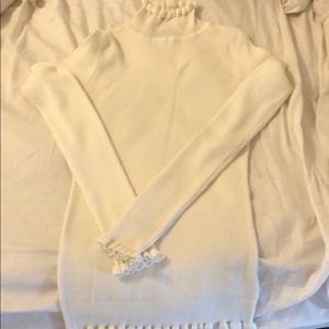 White ruffle turtleneck